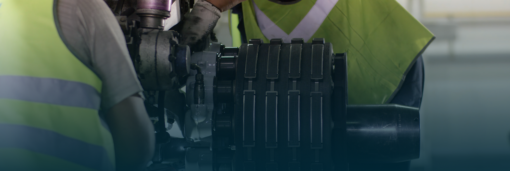 Technicians performing equipment maintenance